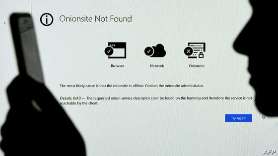 This photo illustration, shows a screen displaying the Darkside Onionsite address with a notice saying it could not be found, in Arlington, Virginia on May 14, 2021. - Servers for Darkside were taken down by unknown actors May 14, 2021, a week after the cyber extortionist forced the shutdown of a large US oil pipeline in a ransomware scam, a US cyber security firm said. (Photo by OLIVIER DOULIERY / AFP)